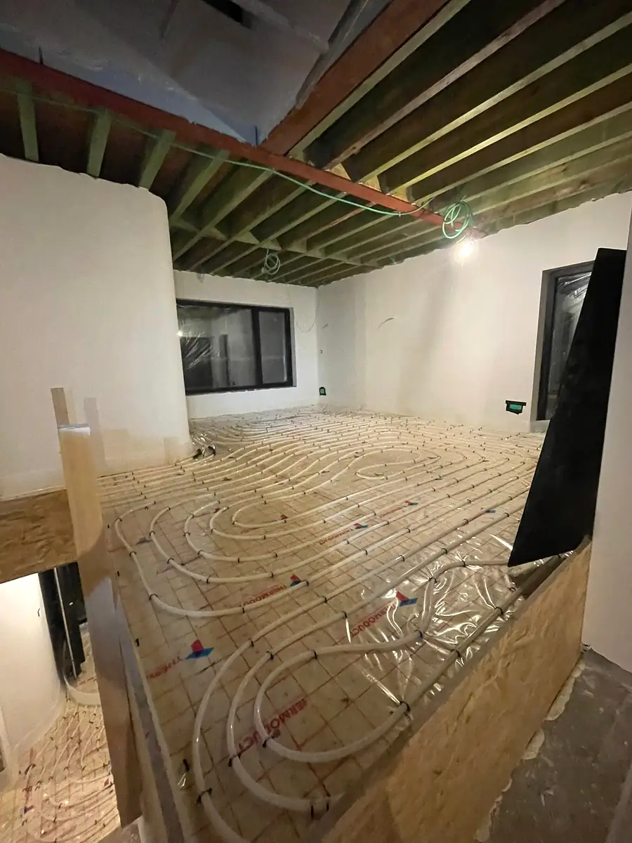 Plancher chauffant installé à l’étage sur un gîtage bois